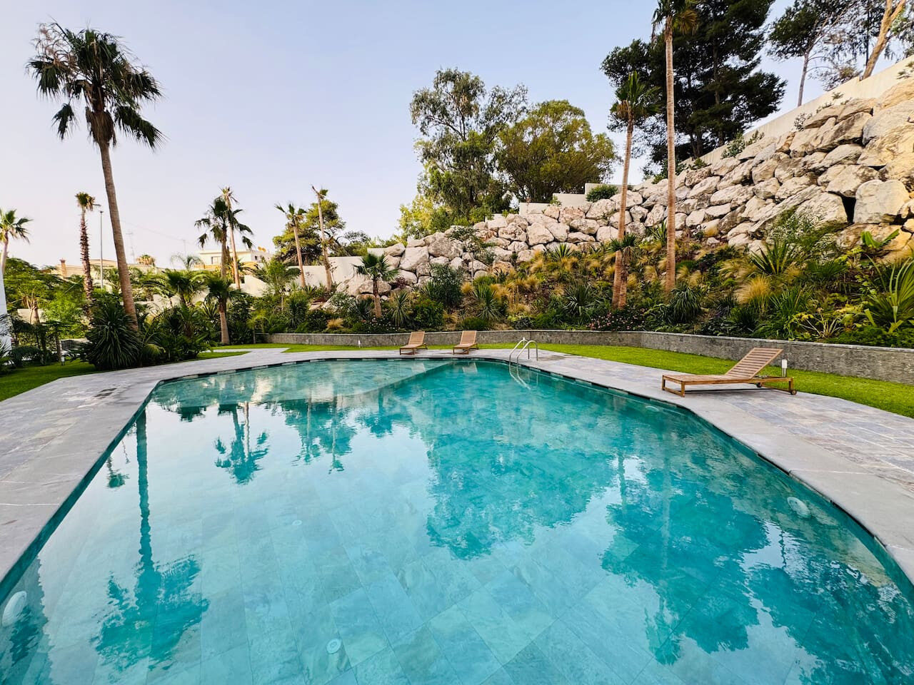 Sunlit 2-Bedroom Apartment with a Pool & Sea Views