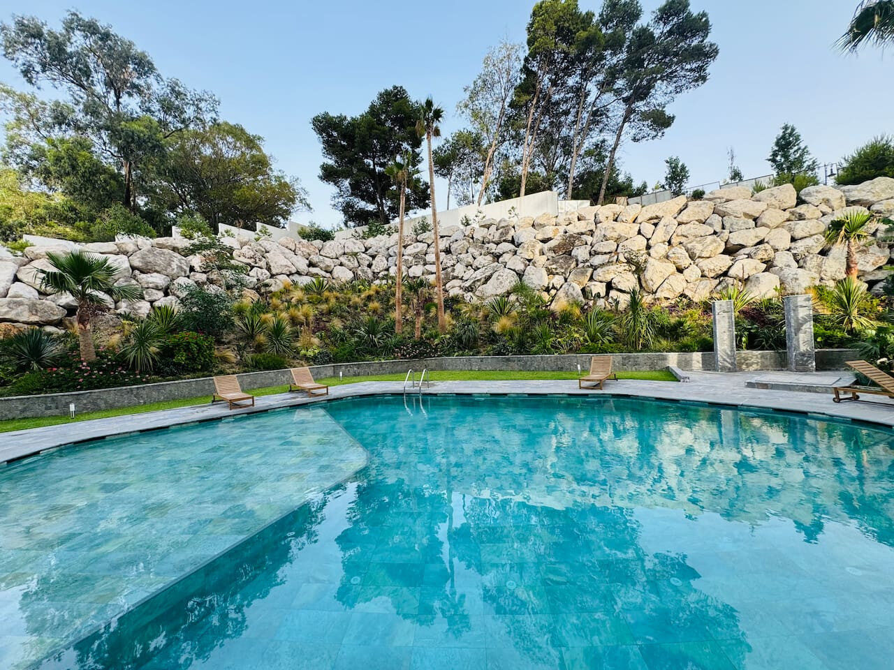 Sunlit 2-Bedroom Apartment with a Pool & Sea Views