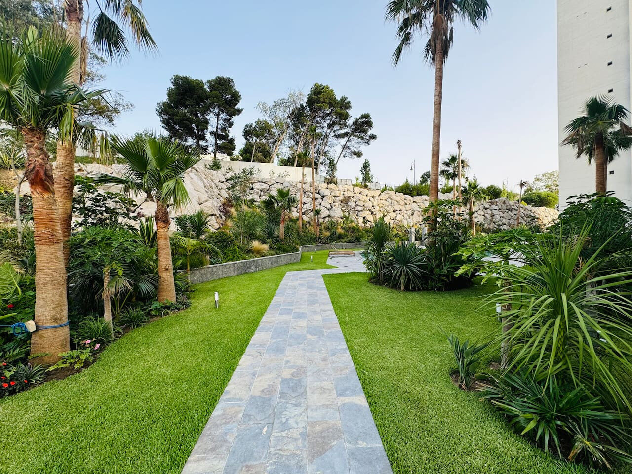 Sunlit 2-Bedroom Apartment with a Pool & Sea Views