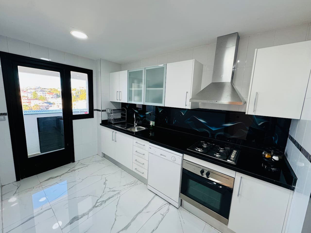 Sunlit 2-Bedroom Apartment with a Pool & Sea Views